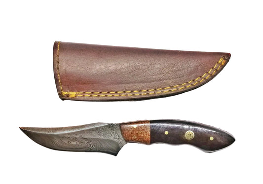 Knife with wooden handle and leather sheath on a white background