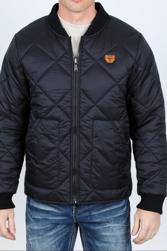 Man wearing a black quilted jacket with a brand logo on a white background