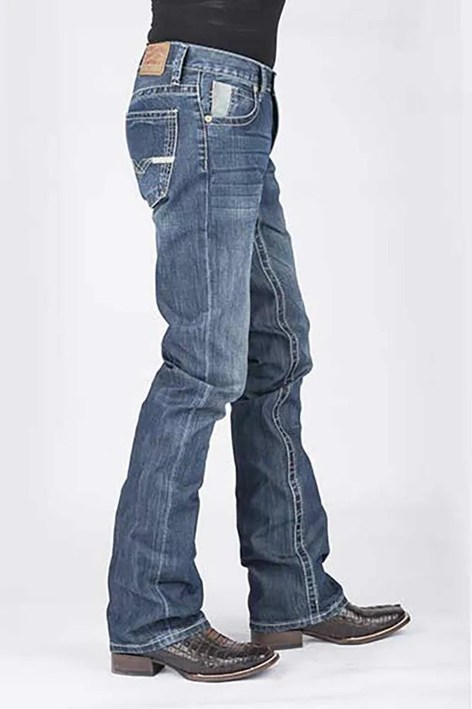 Blue jeans worn by a person on a white background