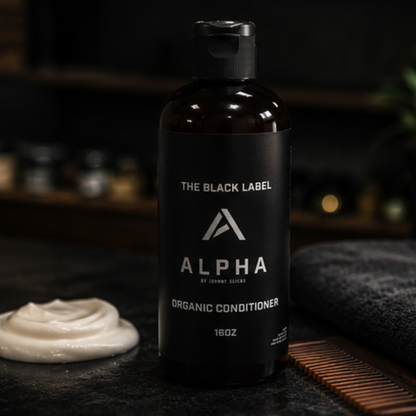 Alpha Organic Conditioner bottle with a black label on a dark background
