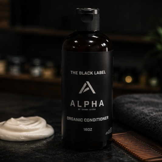 Alpha Organic Conditioner bottle with a black label on a dark background