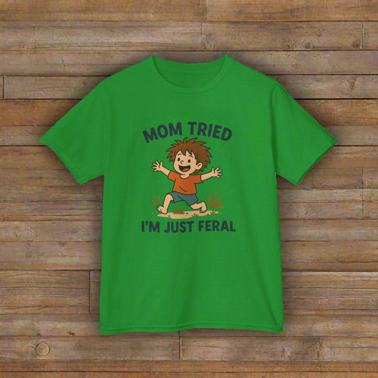 Green t-shirt with a graphic of a child and text 'Mom tried, I'm just feral' on a white background