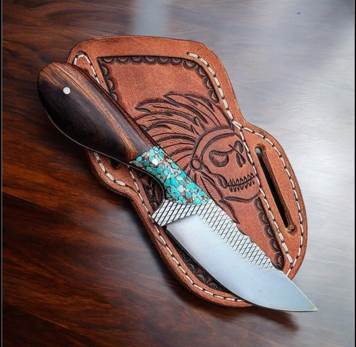 Knife with decorative sheath on a wooden surface