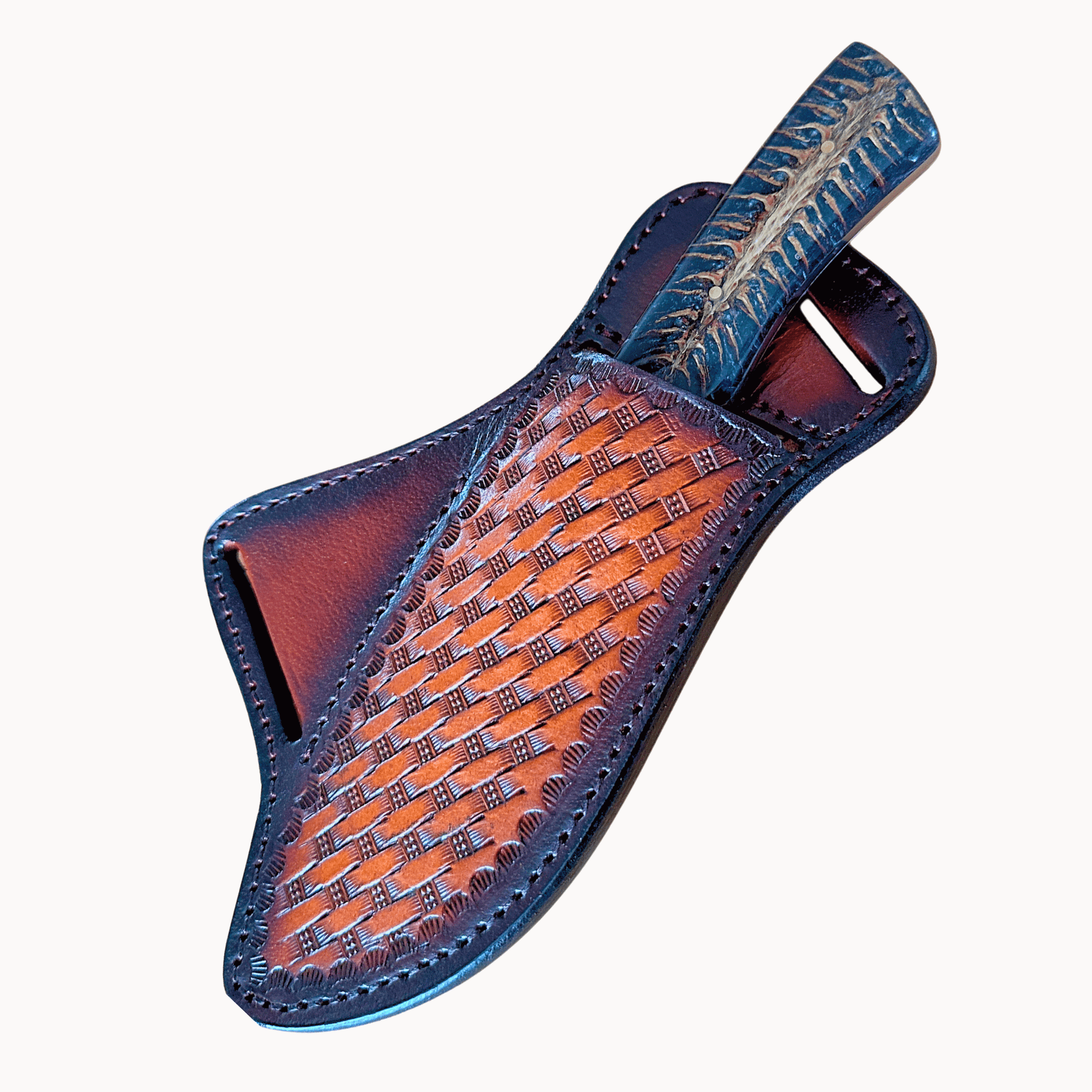 A handcrafted leather sheath with a woven basketweave pattern on the main body and a dark blue pine cone handle knife inserted, shown on a plain off-white background.