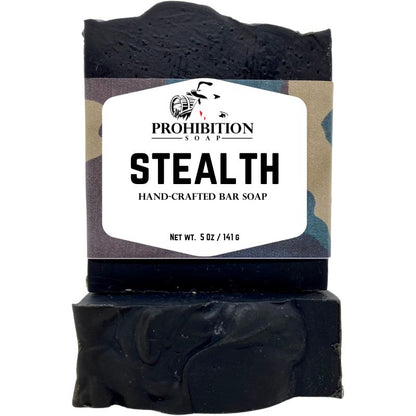 Black bar of soap with 'Prohibition Soap' label on a white background