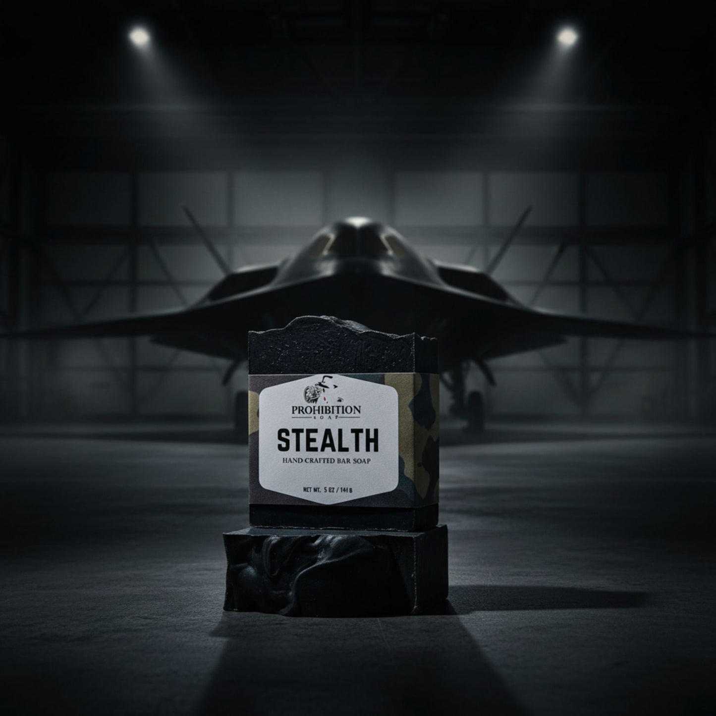 Bar of soap labeled 'Stealth' in front of a fighter jet in a hangar.