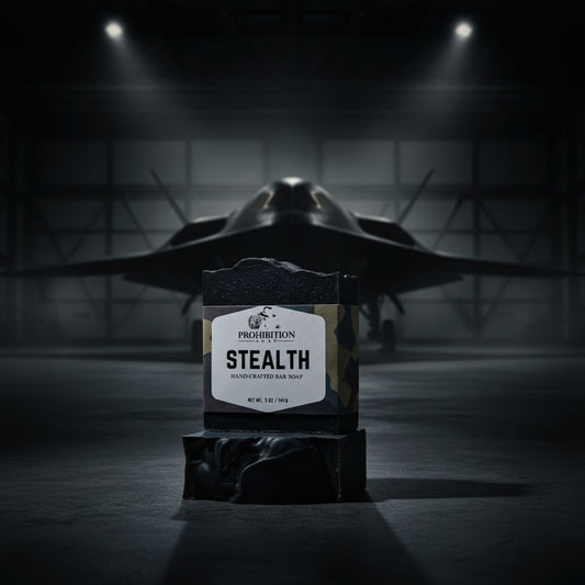 Bar of soap labeled 'Stealth' in front of a fighter jet in a hangar.