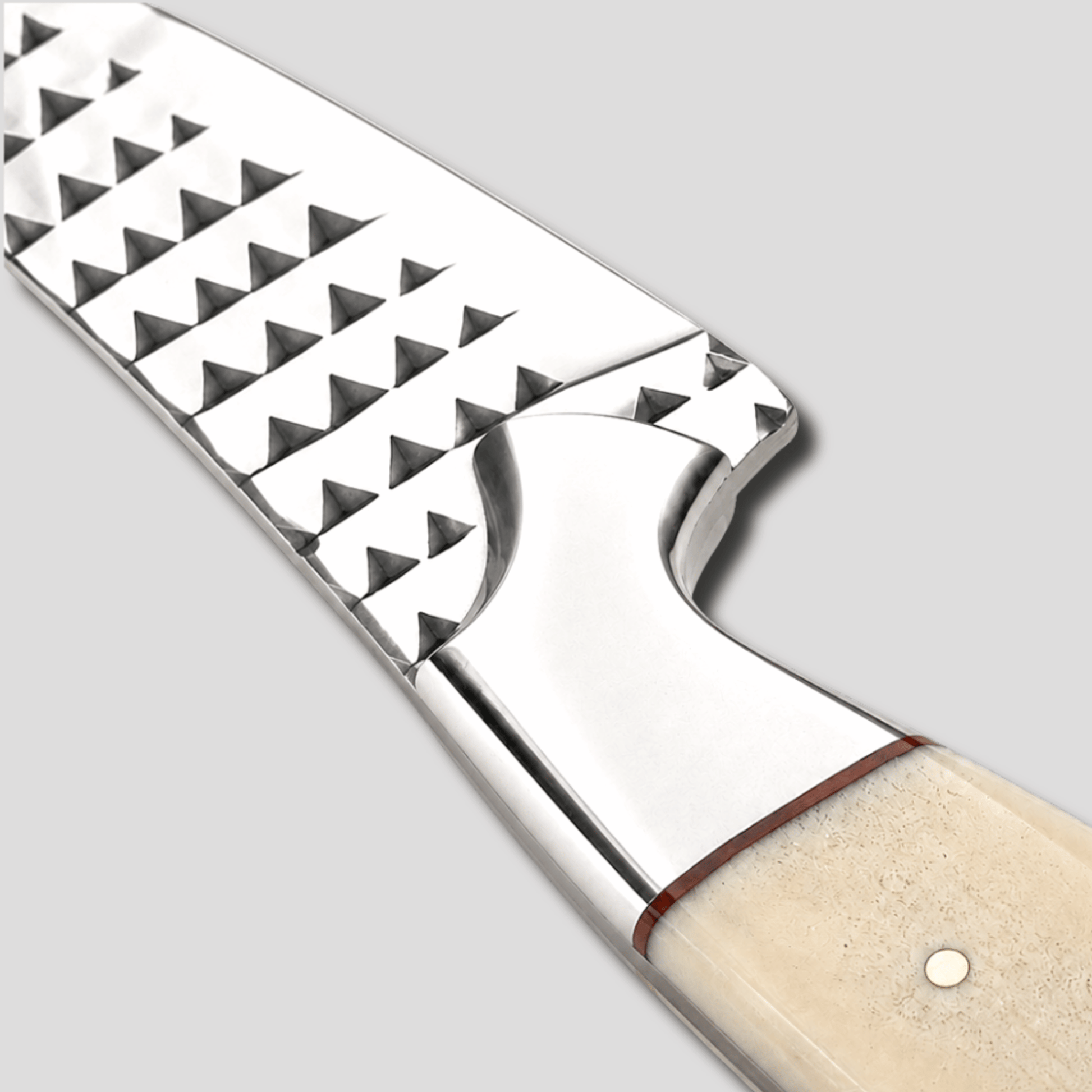 Silver Badlands handmade rasp tool steel knife partially drawn from its feather-tooled leather pancake sheath on a white studio background.
